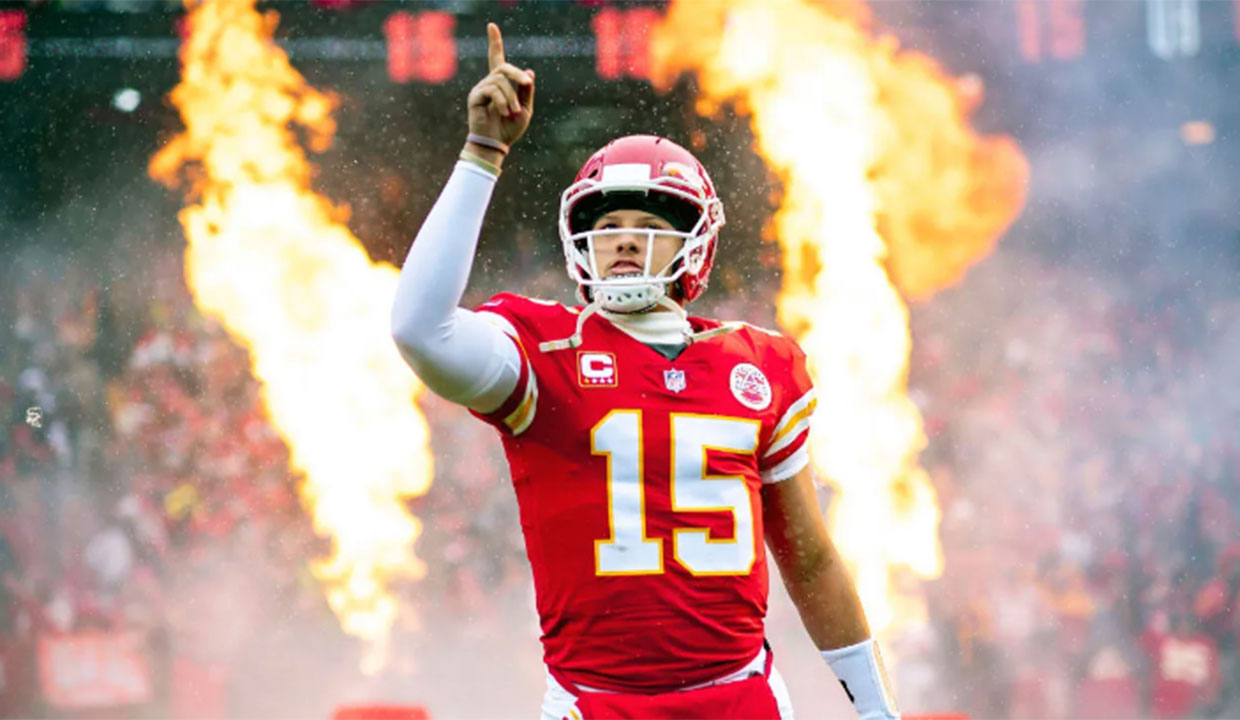 image of a quarterback with fire exploding behind him